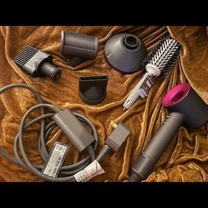 Dyson hair dryer(used)..does have 2 year warranty